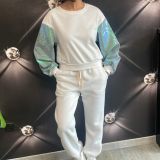 FELPA CROP CON MANICHE  PAILLETTES bianco