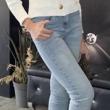 JEANS SKINNY CON TASCA SVAROSKY MACULATA