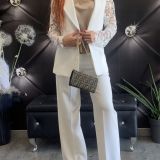TAILLEUR CON MANICHE IN PIZZO bianco