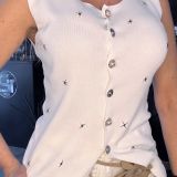 GILET IN FILO CON BOTTONI GIOIELLO colore latte