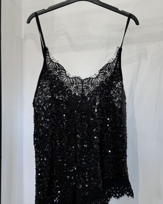TOP TRASVERSALE PAILLETTES E PIZZO nero