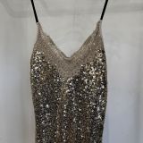 TOP TRASVERSALE PAILLETTES E PIZZO oro
